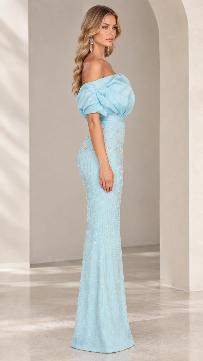 Side view of light blue off-the-shoulder embellished formal gown