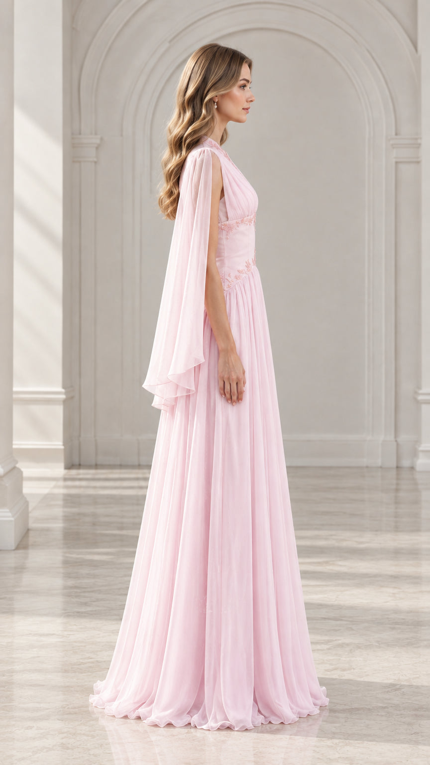 Side angle view of Light Pink chiffon evening gown showing flowing cape sleeves