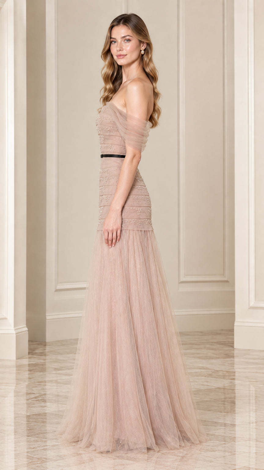 Side profile of champagne drop-waist beaded tulle formal dress
