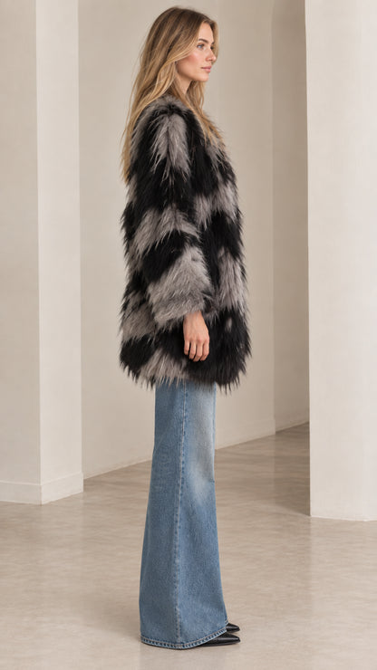Side profile view of black and grey chevron fluffy faux fur jacket