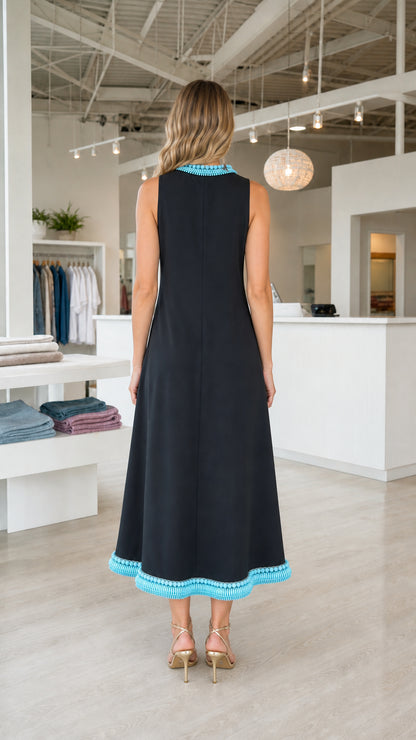 Back view of black sleeveless midi dress showing back zipper detail