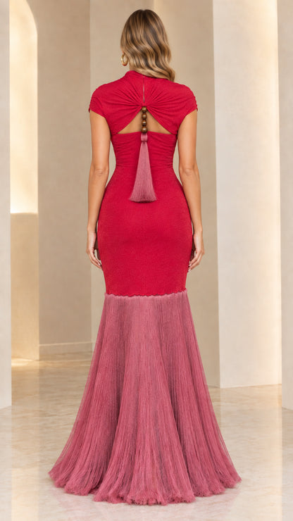 Back view showing diamond cutout and beaded tassel detail on Berry Pink mermaid gown