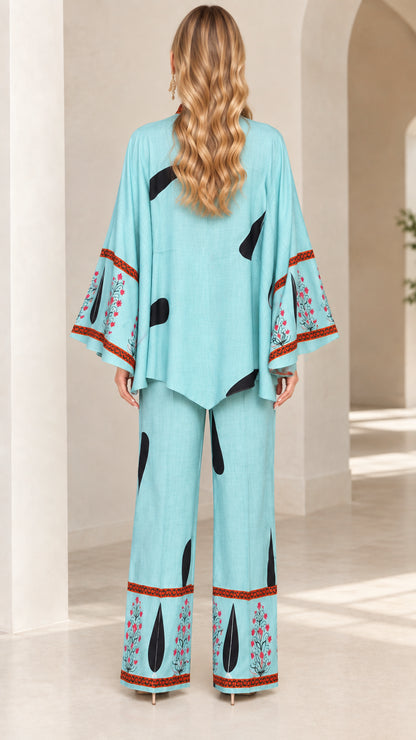 Back full view of sky blue matching tunic and wide-leg pants set