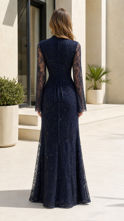 Back view of navy blue lace evening gown showing corset lace-up tie detail