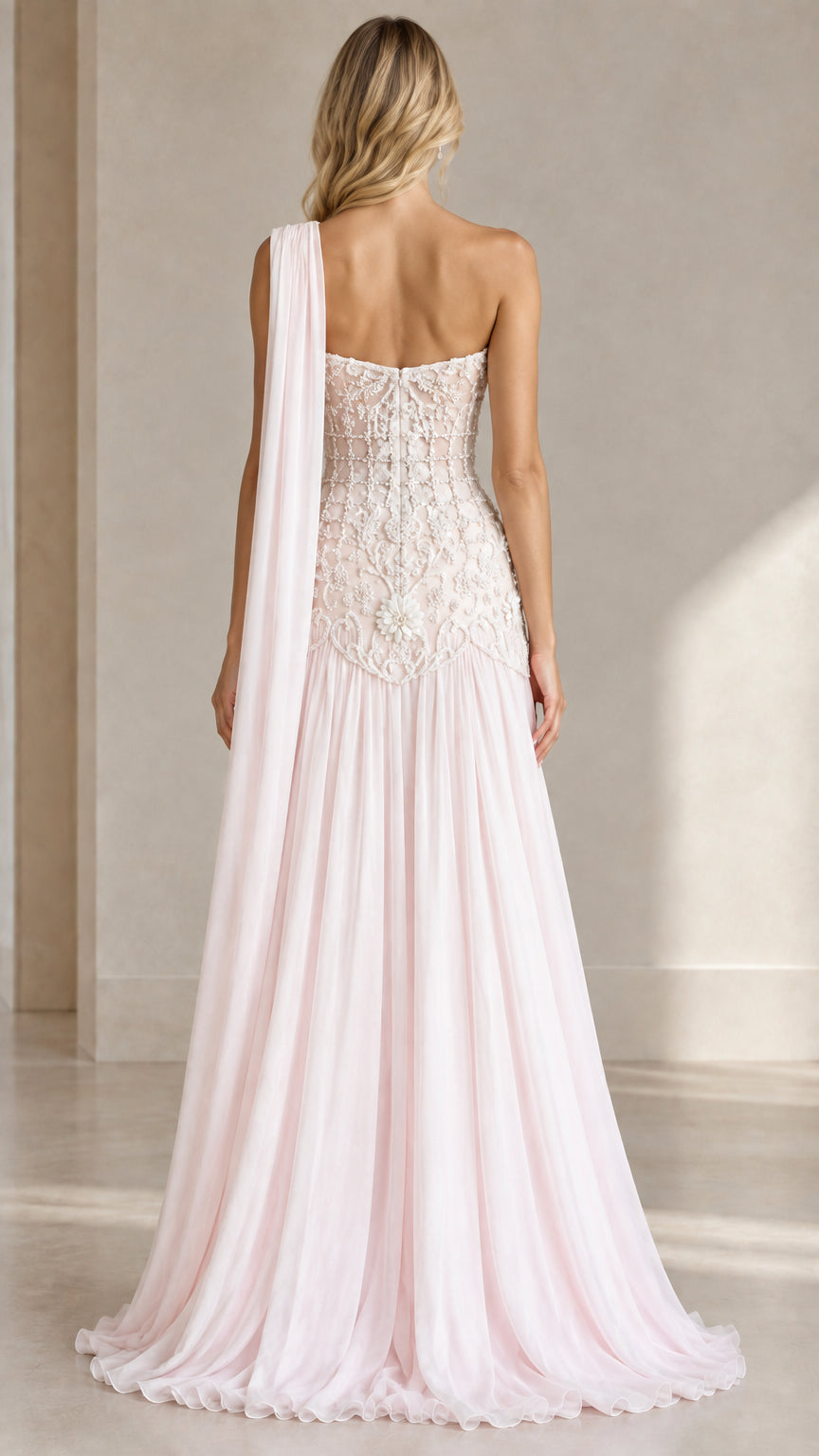 Back view of Blush Pink one-shoulder evening dress with shoulder sash