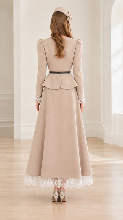 Back view of woman wearing elegant beige peplum jacket and maxi skirt with lace trim