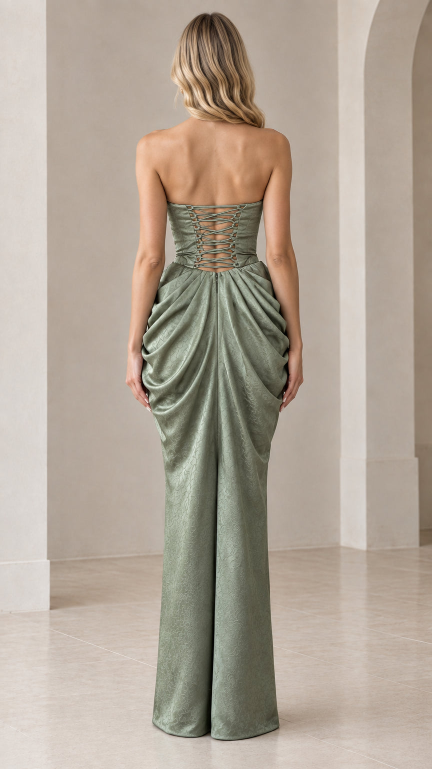 Back full-length view of Sage Green evening gown highlighting lace-up corset detail