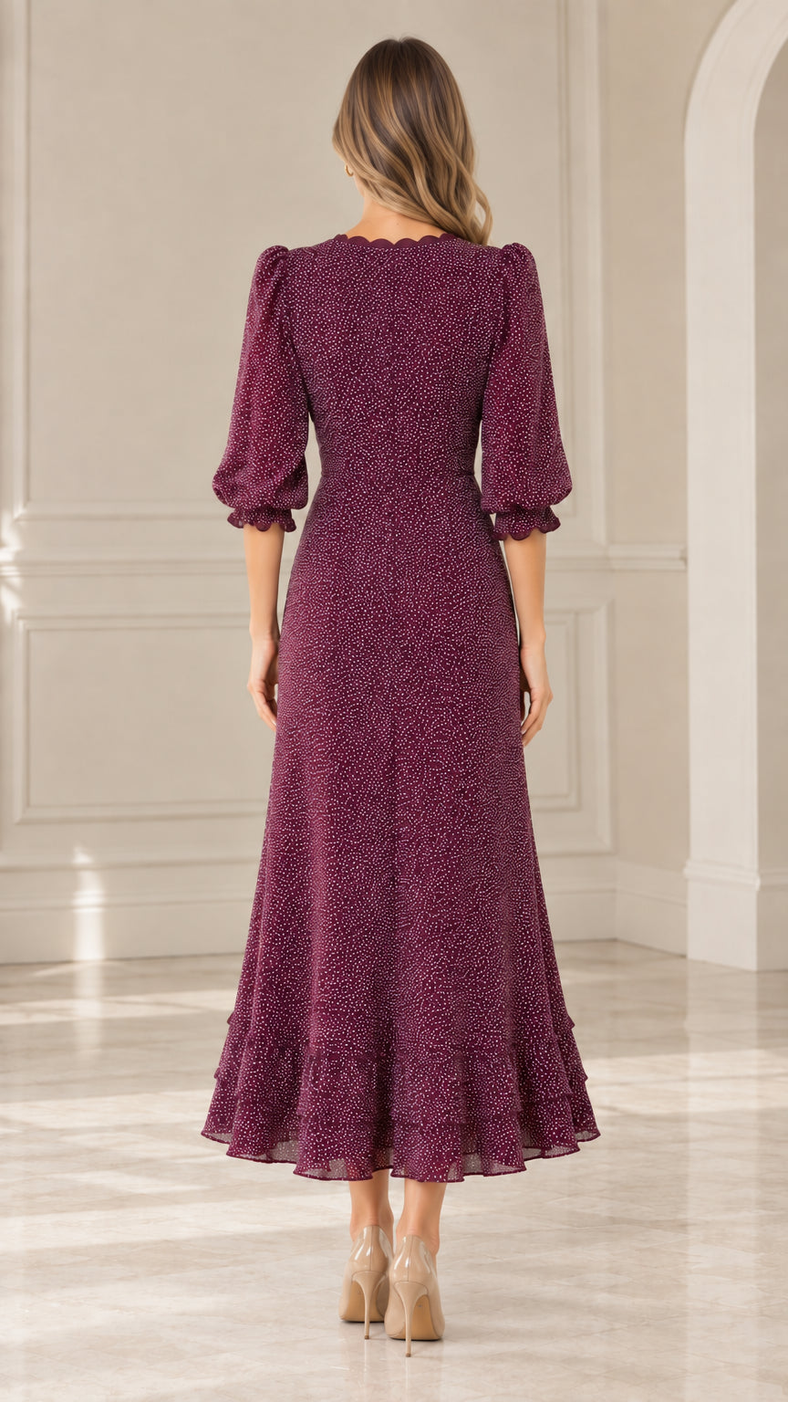 Back view of model wearing Burgundy 3/4 sleeve dotted midi dress