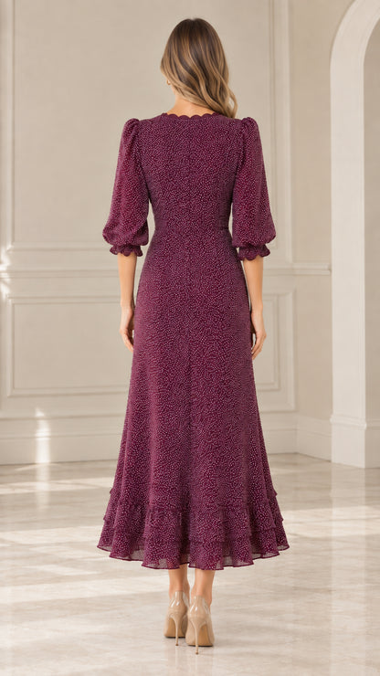 Back view of model wearing Burgundy 3/4 sleeve dotted midi dress