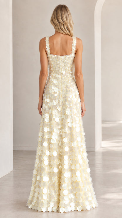 Back view of model wearing ivory square back paillette sequin maxi dress