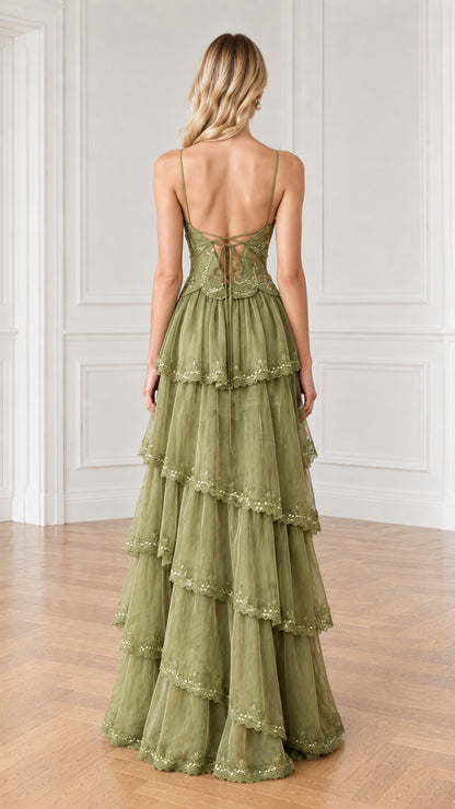 Back view of olive green maxi dress showing delicate lace-up corset detail