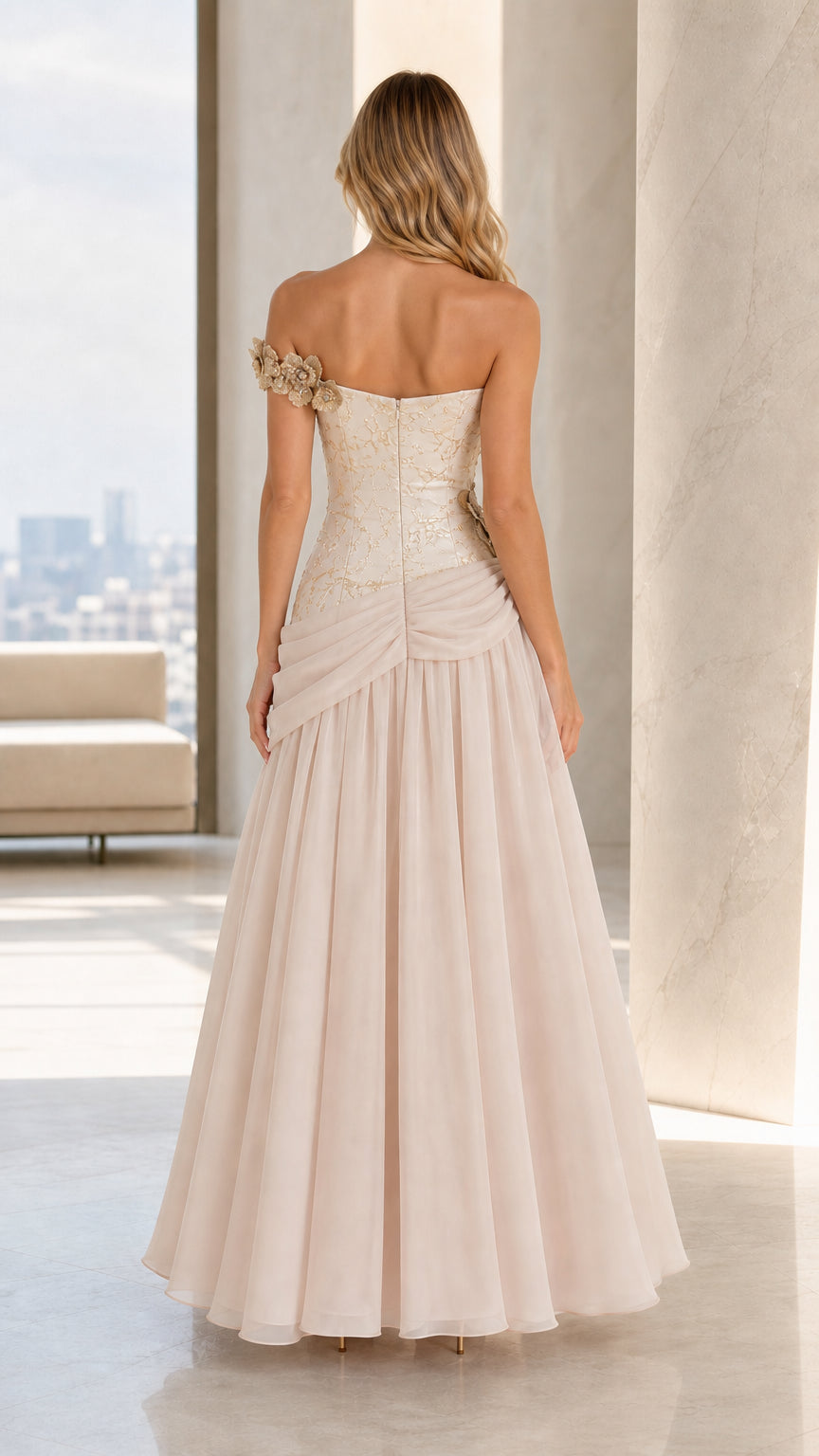 Back view of Champagne strapless formal gown showing back bodice and pleated skirt