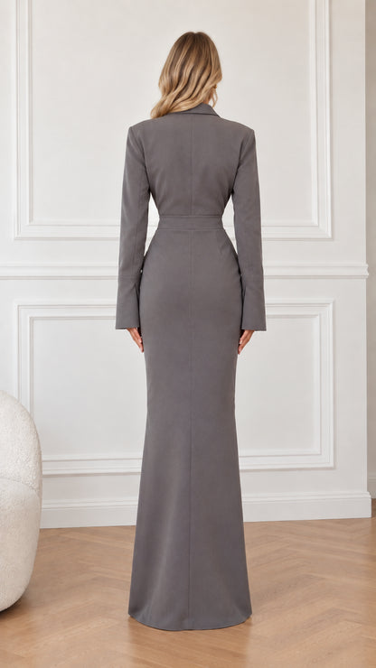 Back view of model showing tailored fit of charcoal grey long sleeve maxi dress
