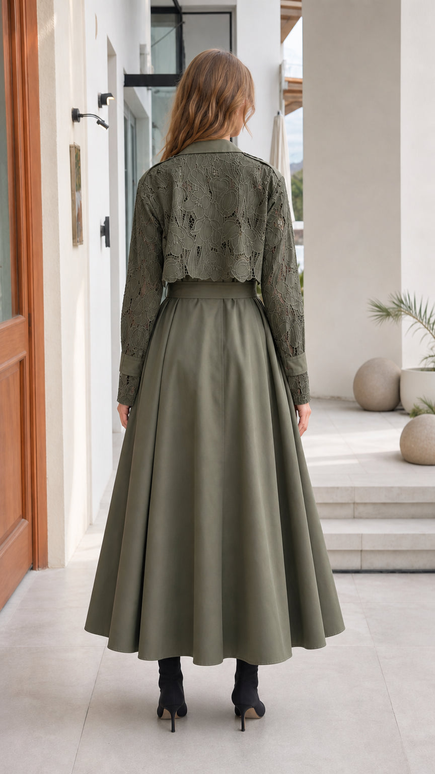 Back view of woman wearing Olive Green maxi trench dress showing lace back yoke