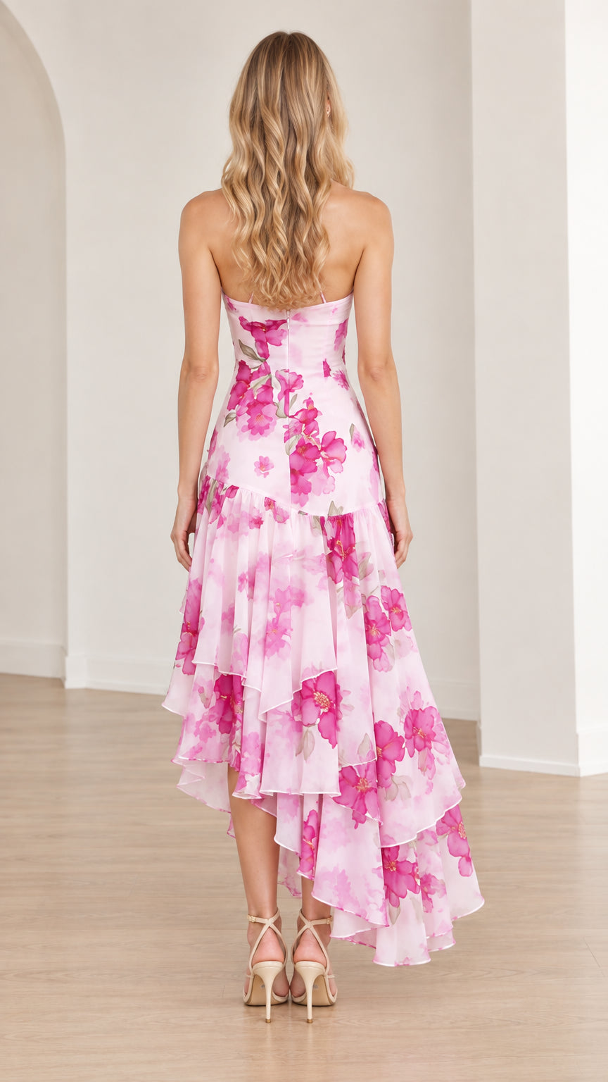 Back view of Blush Pink floral high-low dress with slender straps