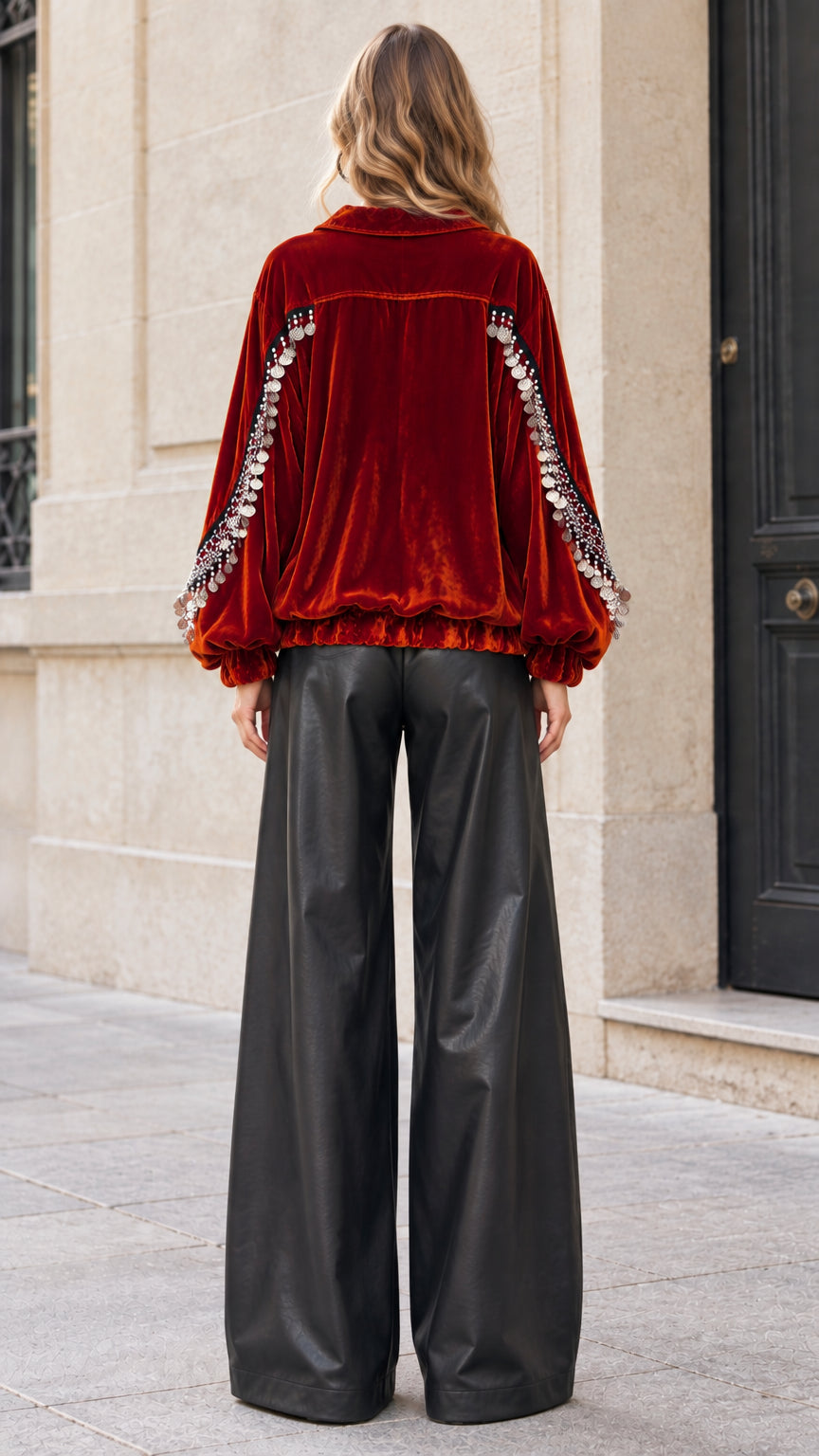 Back view of rust velvet jacket showing back yoke and coin embellishments