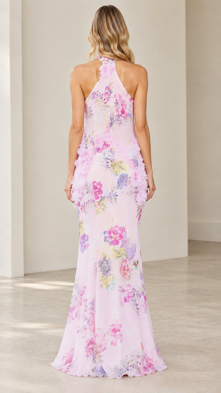 Back view of model wearing Blush Pink floral high-neck maxi dress