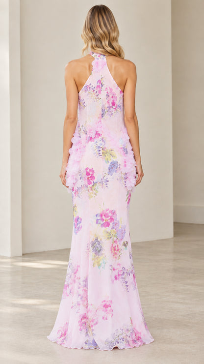 Back view of model wearing Blush Pink floral high-neck maxi dress