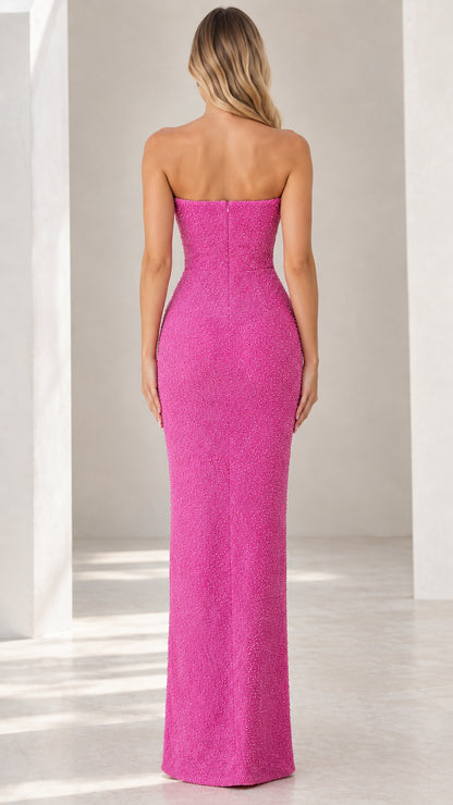 Back view of fuchsia strapless column evening dress showing zip closure