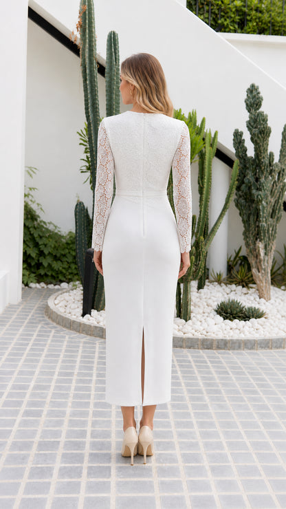 Back view of model wearing white lace midi dress with back slit
