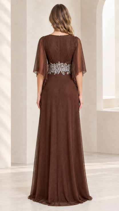 Back view of model wearing floor-length brown evening gown with flutter sleeves