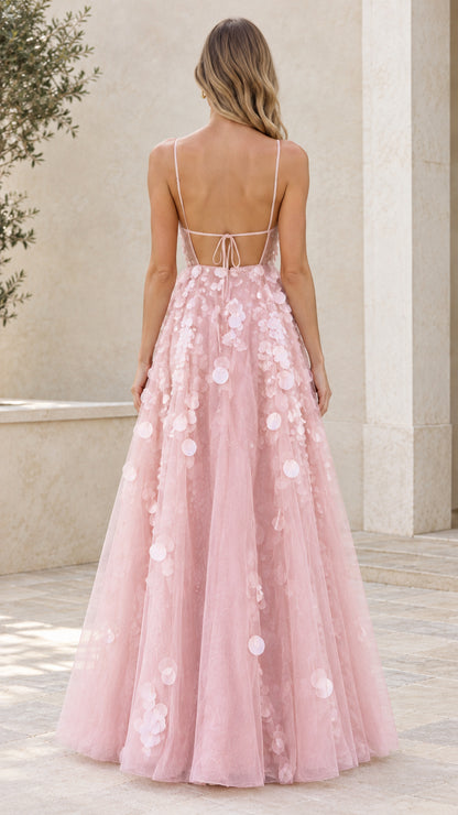 Back view of blush pink tulle gown showing open back and tie detail