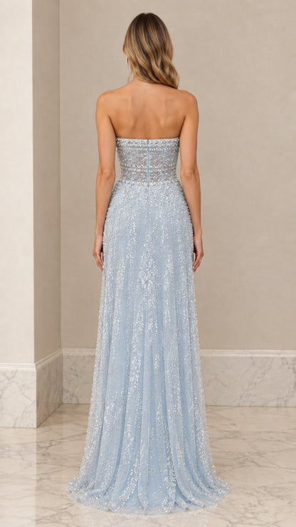 Back view of model in Light Blue strapless embellished floor-length gown