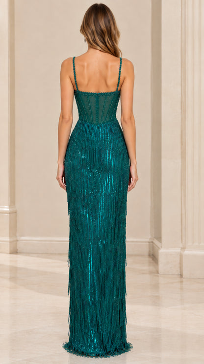 Back view of model wearing the Emerald Green sequin fringe corset formal dress