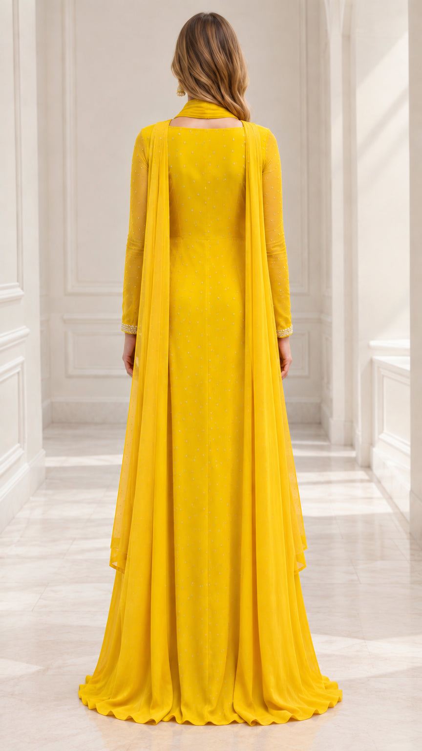 Back view of yellow floor-length formal gown highlighting draped cape panels