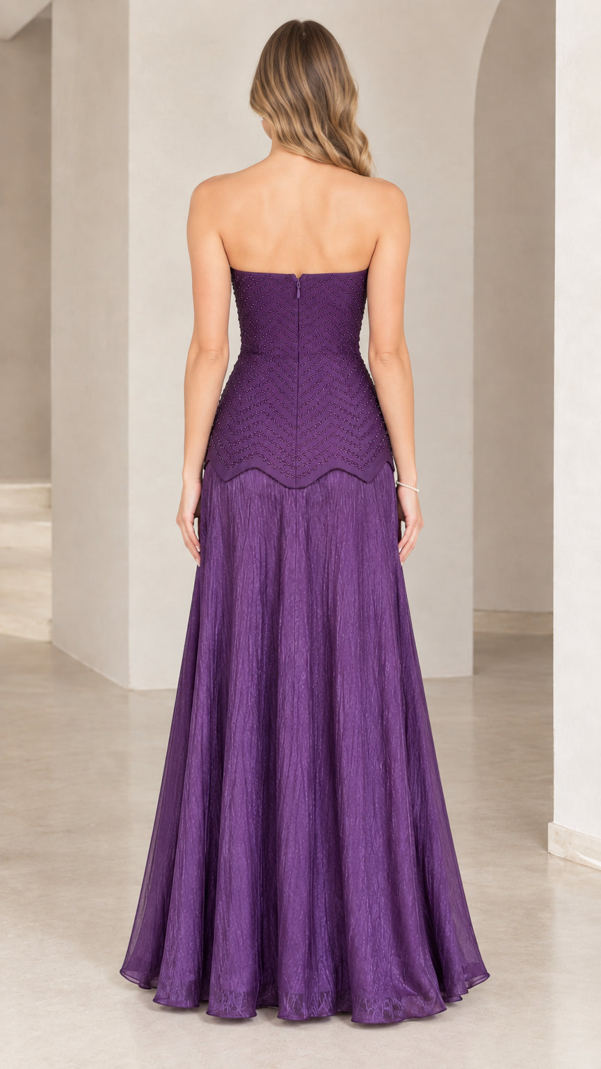 Back view of purple strapless maxi dress showing clean line and zip closure