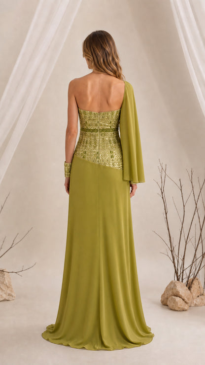 Back view of olive green strapless evening gown showing one-sided flowing cape sleeve