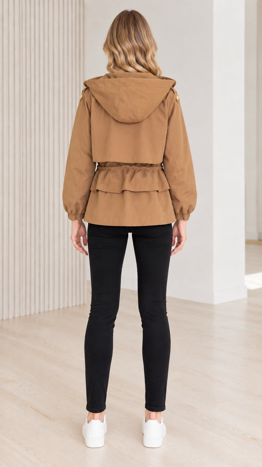 Back view of model wearing camel utility jacket showing tiered peplum ruffle hem