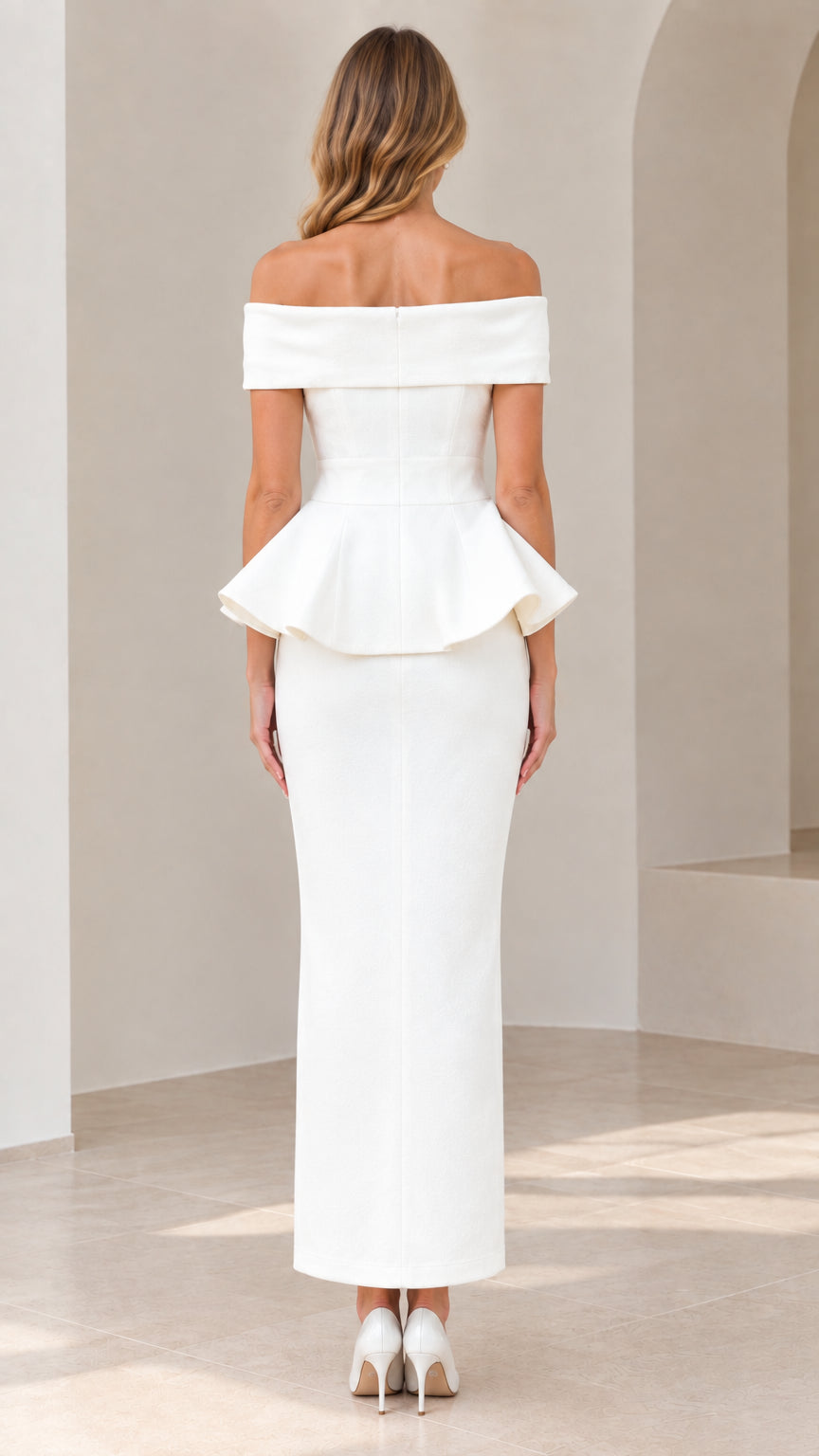Back view of model showing tailored fit and peplum detail on white maxi dress