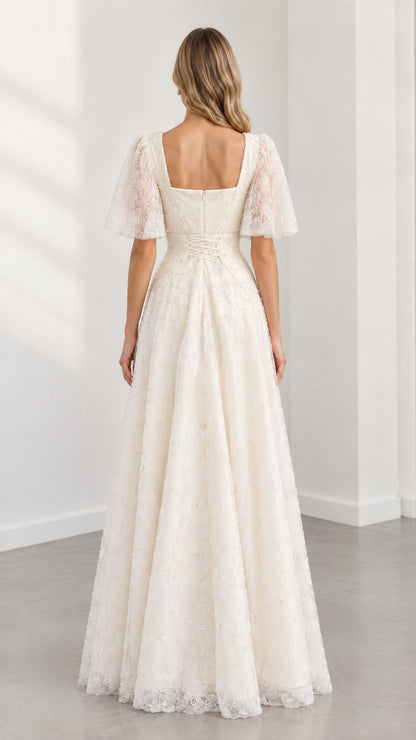 Back view of cream square back formal maxi dress showing fitted waist