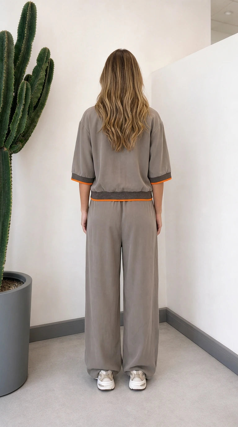 Back view of model wearing grey two-piece wide-leg lounge set