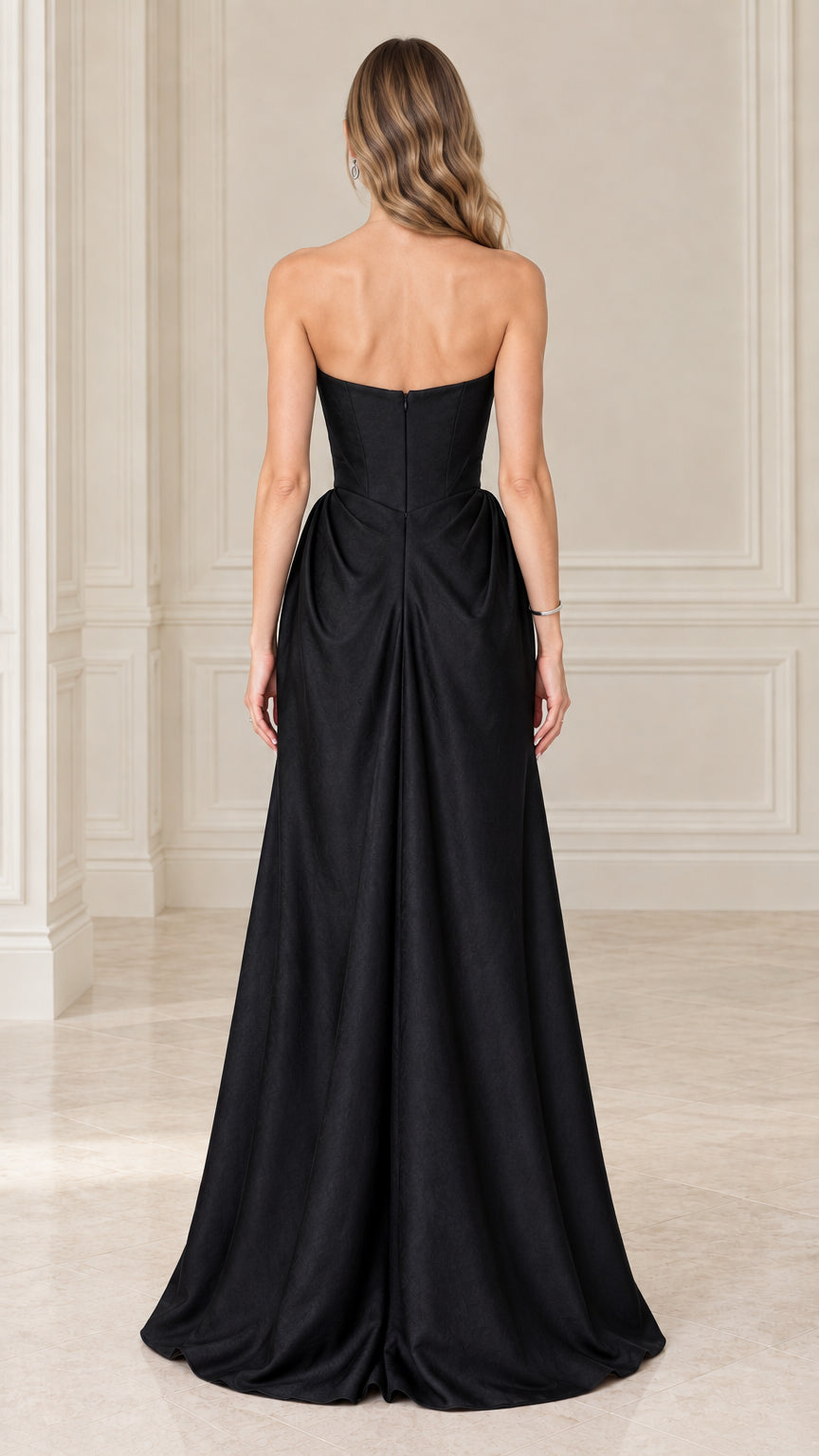 Model wearing black strapless satin corset maxi gown back view