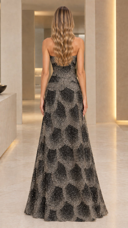 Back view of black strapless maxi evening dress