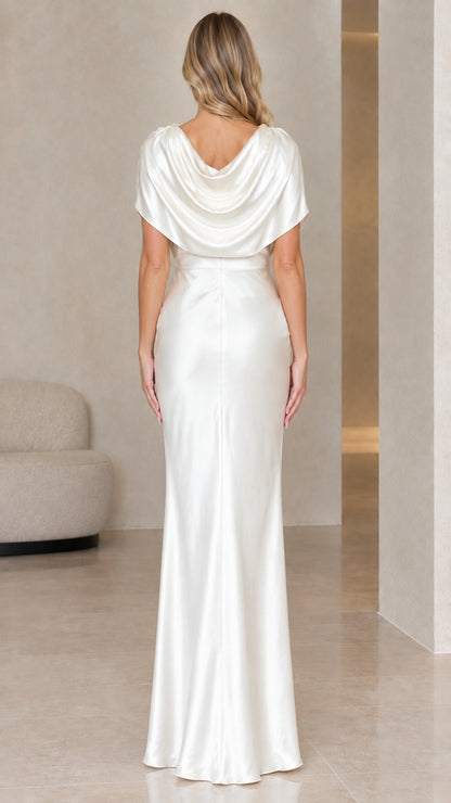 Back view of ivory satin evening dress showcasing draped cowl back design