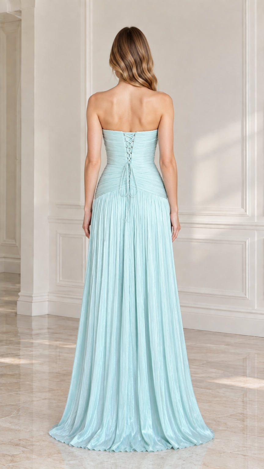Back view of light blue pleated evening gown showing lace-up corset back