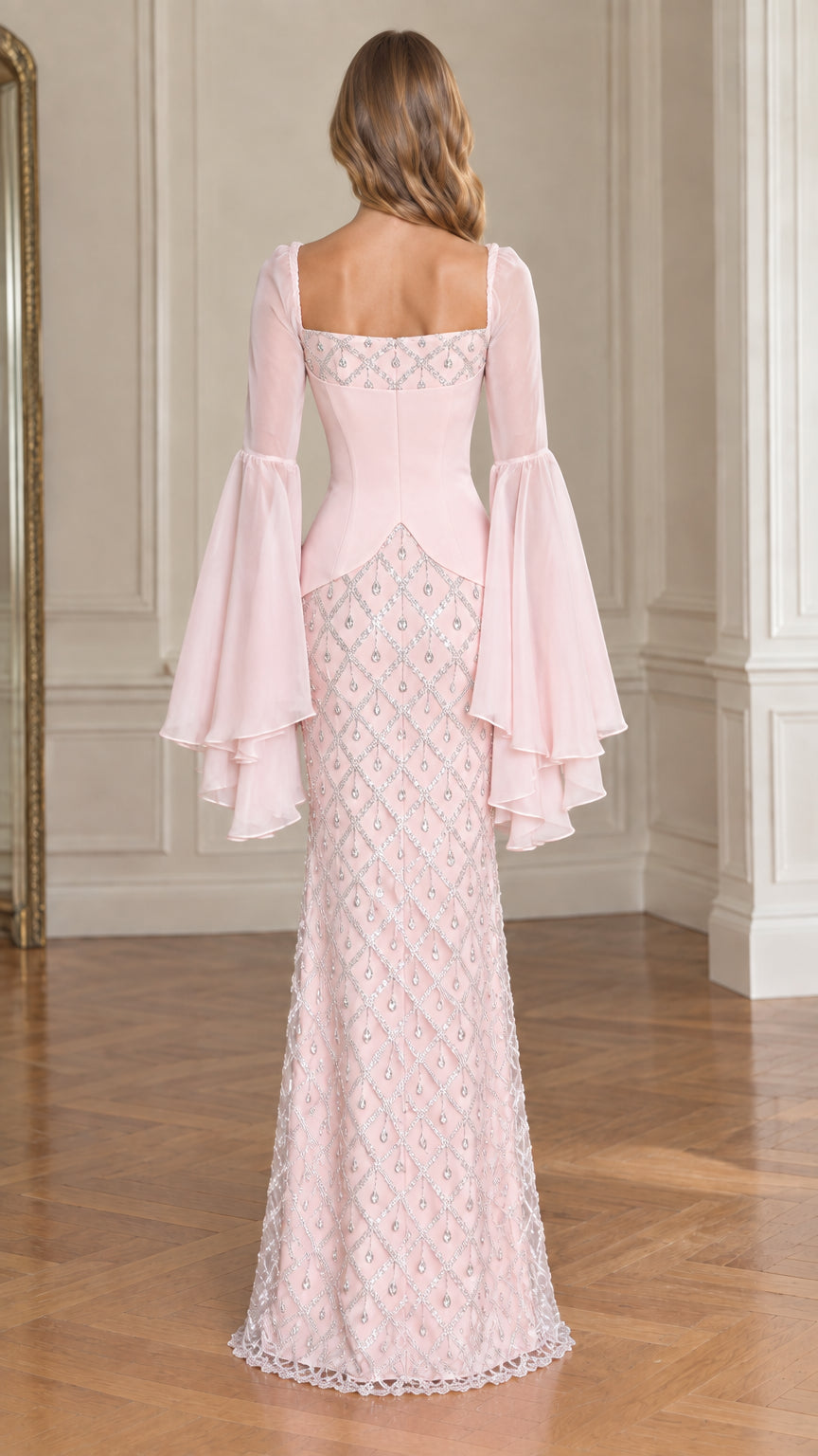 Back view of model in Blush Pink formal gown showing square back and flowing sleeves