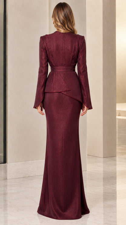 Back view of model in burgundy long sleeve floor-length gown showing back zipper line