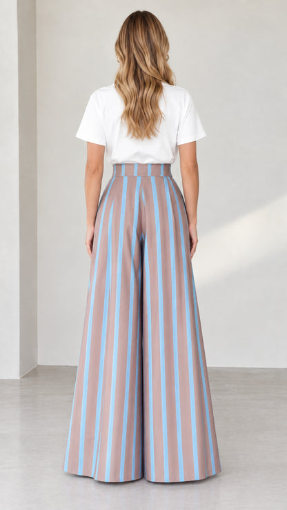 Back view of woman wearing high-waisted striped maxi trousers and white t-shirt