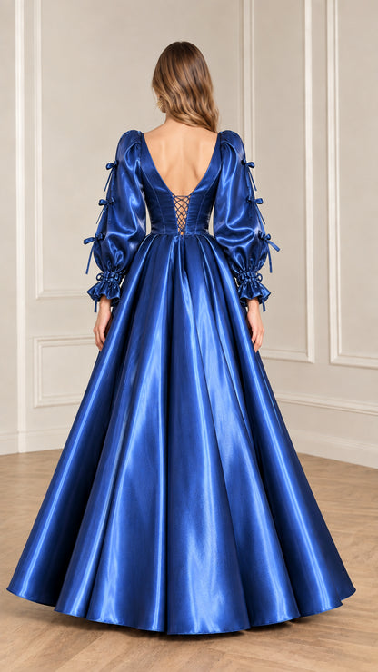 Back view of model in Royal Blue satin dress showcasing lace-up corset back