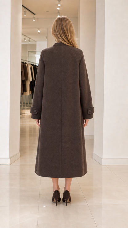 Back view of woman wearing tailored espresso brown maxi coat