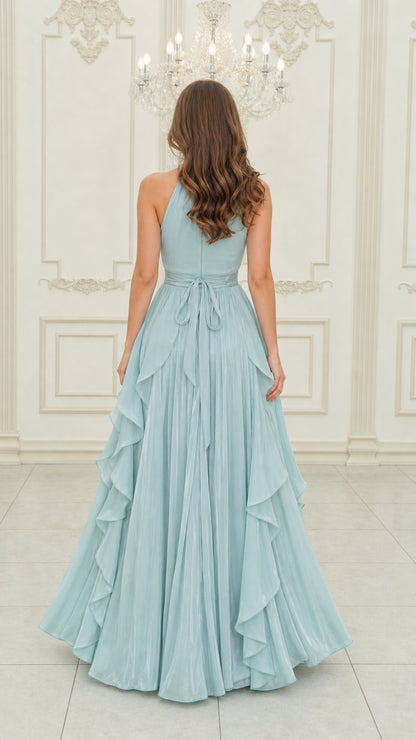 Back view of light blue halter gown showing back silhouette and waist tie