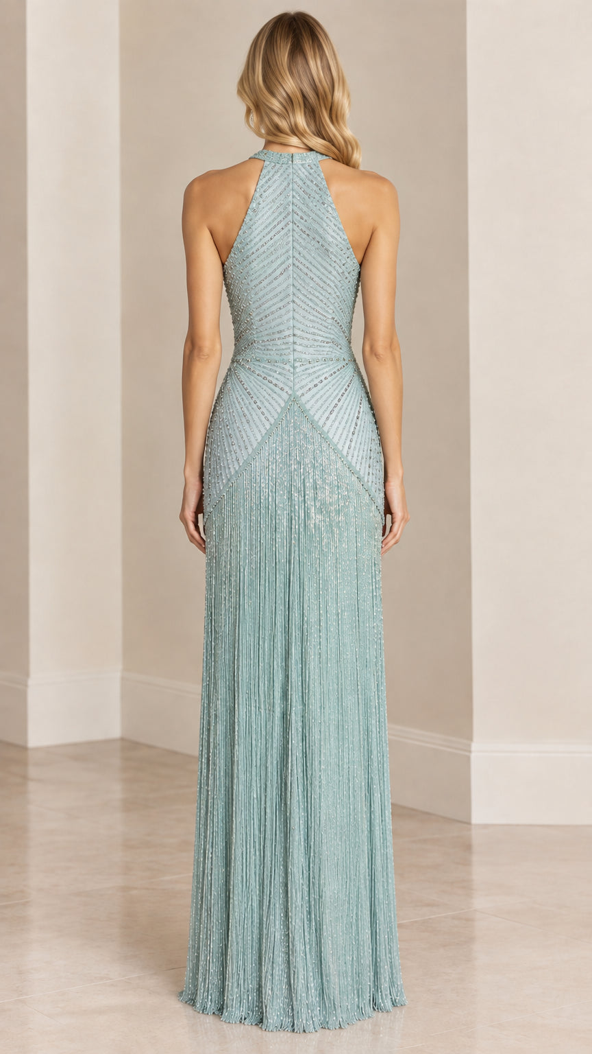 Back view of model in Sage Green halter beaded gown with open back detail