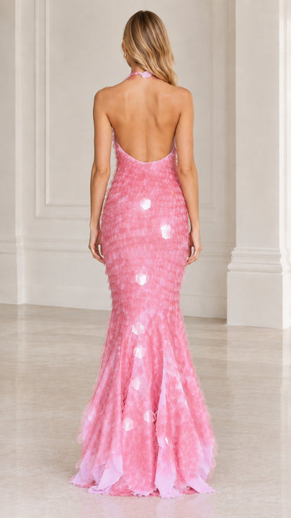 Back view of pink backless halter mermaid maxi gown