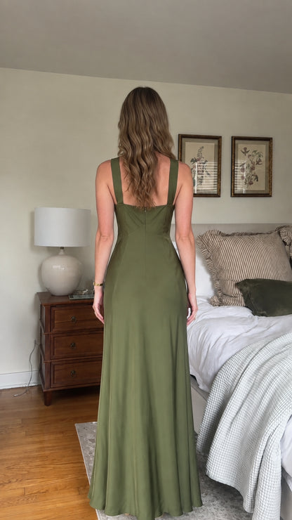 Back view of olive green satin maxi dress with wide shoulder straps