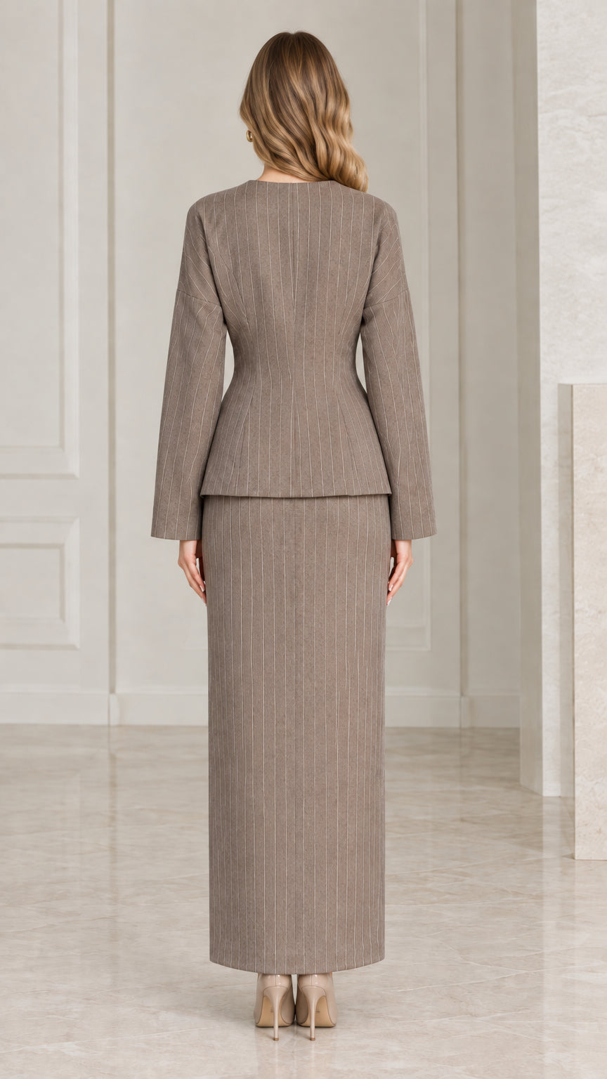 Back view of taupe tailored pinstripe jacket and column maxi skirt