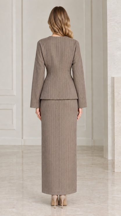 Back view of taupe tailored pinstripe jacket and column maxi skirt